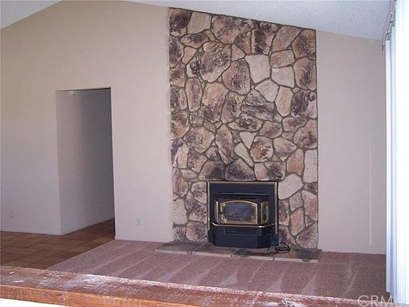 Formal living room with vaulted ceilings.
