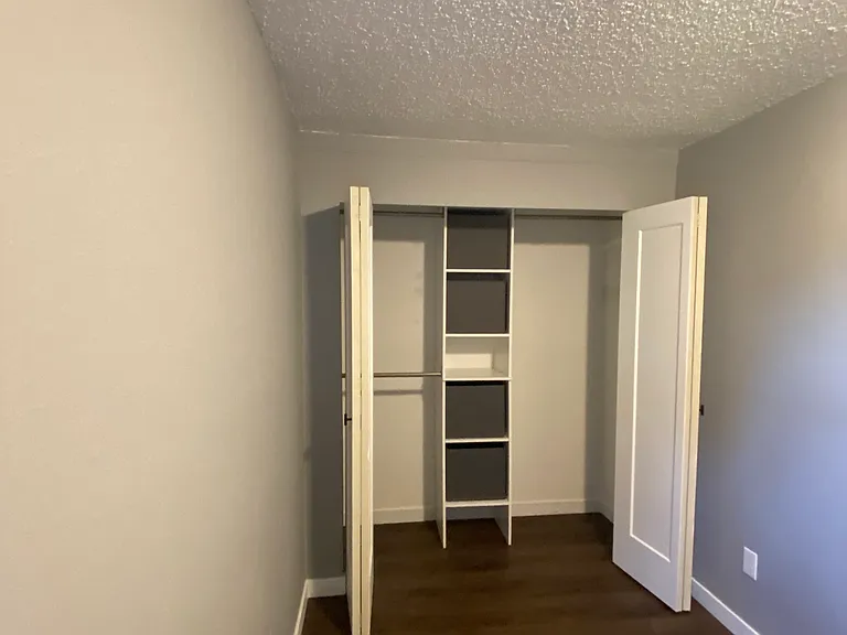 Secondary bedroom with new built in closet with plenty of storage space