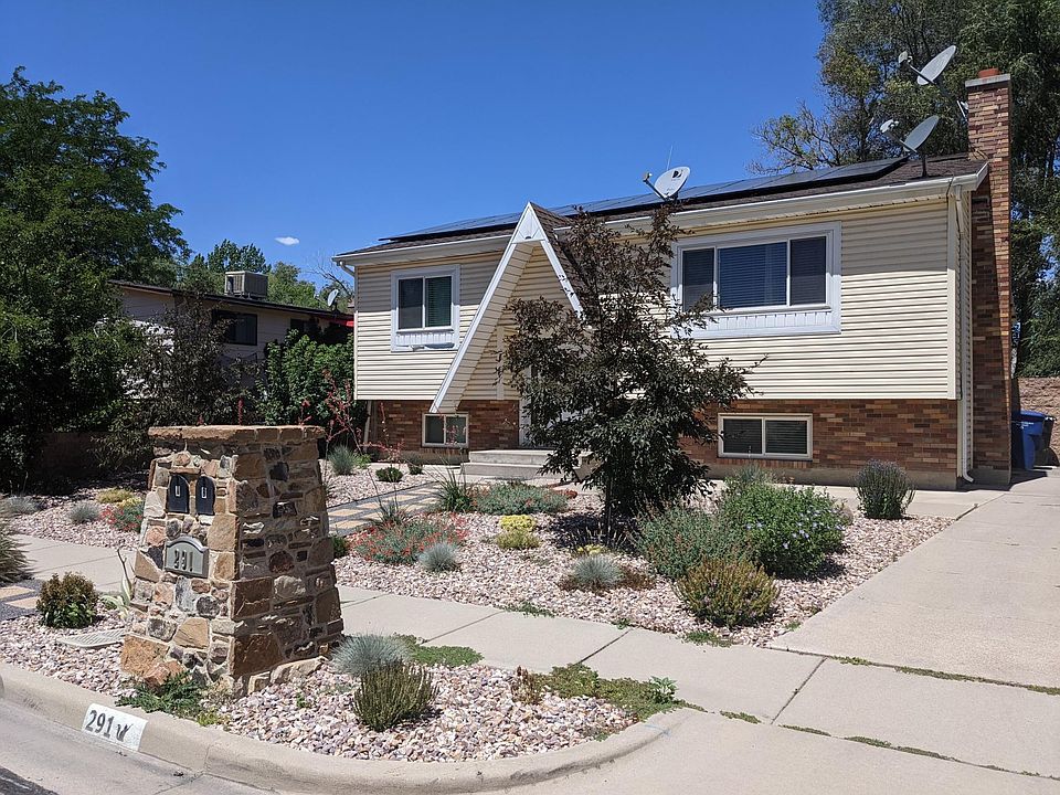 Front of House with new professional xeriscaping.