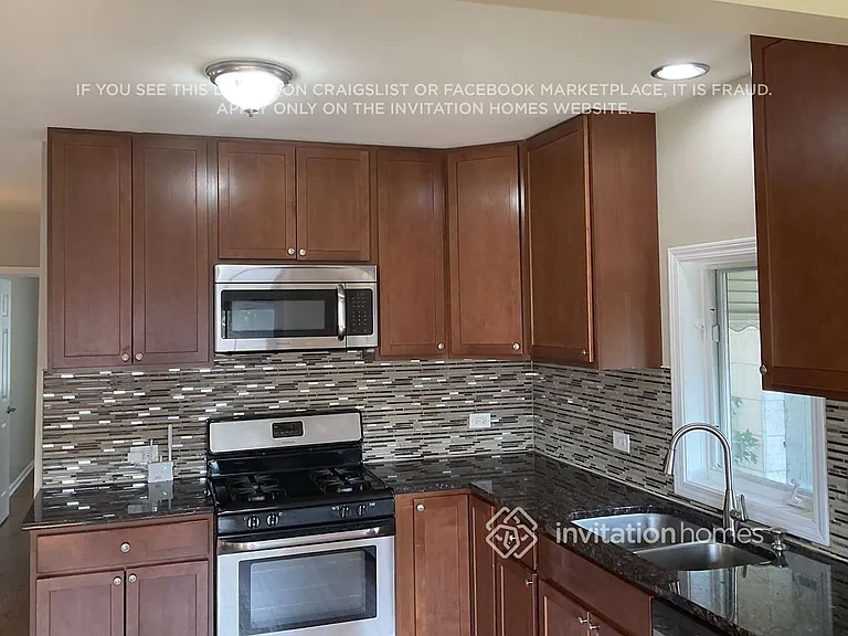 2418 N 75th Ct — Photo 3