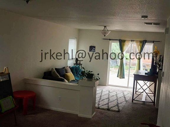 living and dining area, kitchen on the far right