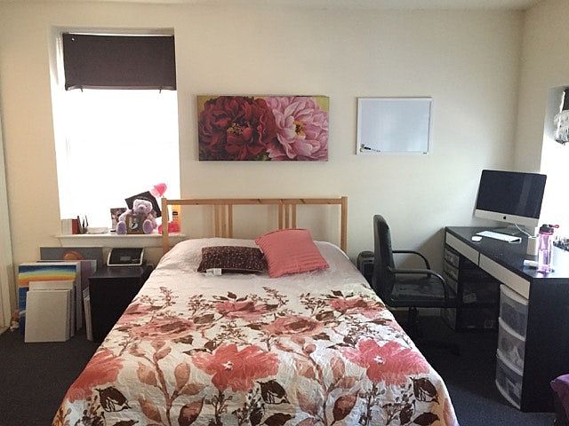 Main room - full-size bed, nightstand, desk and chair