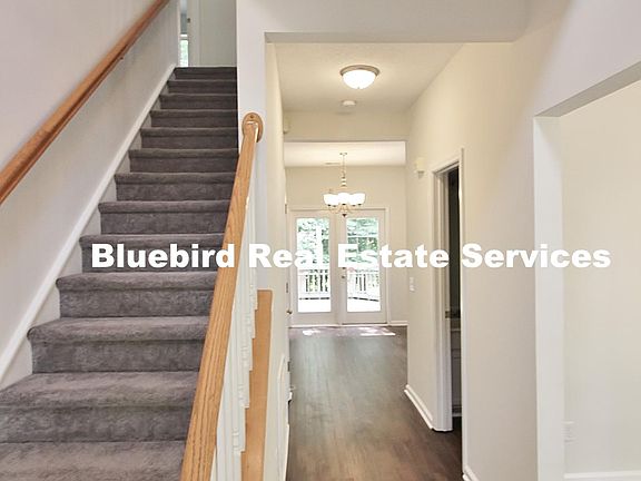 Two story foyer greets you as you walk in.