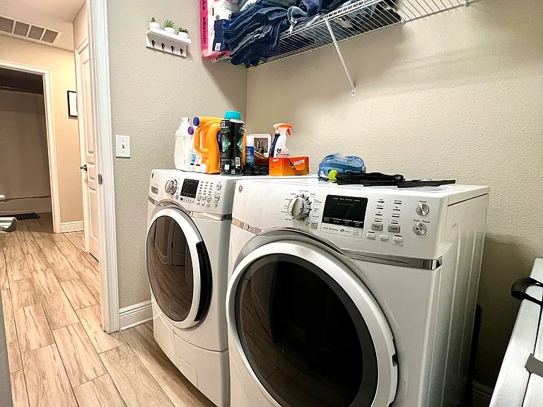 Rear entryway with full laundry room