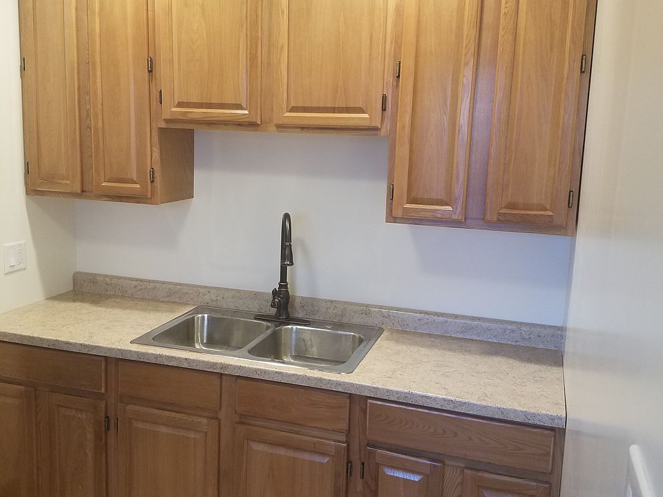 Kitchen with high cabinets