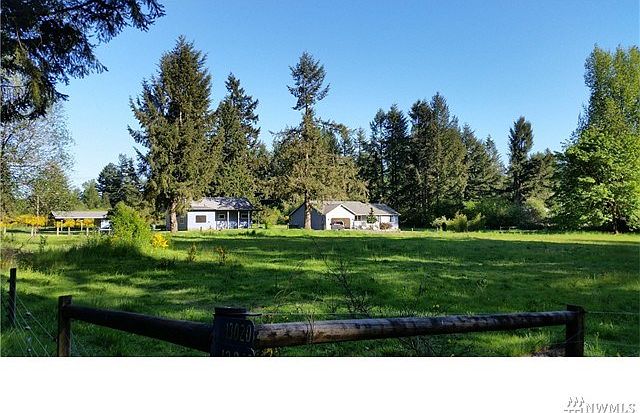 View From Tilley Road. 2.85 Acres surround this home. Pastures are fenced