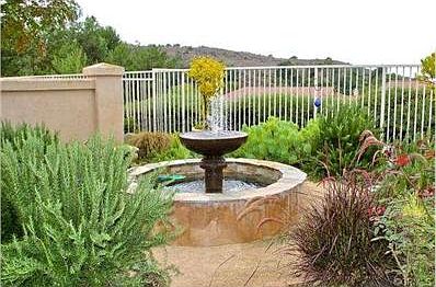 Dreamy backyard with a private sanctuary of a garden, plus a soo