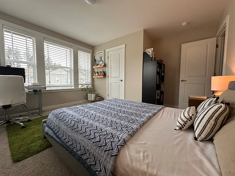 Guest Room with walk-in closet door on the left