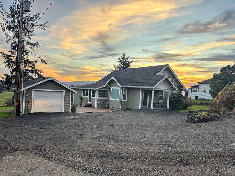 Front of house, patio, garge