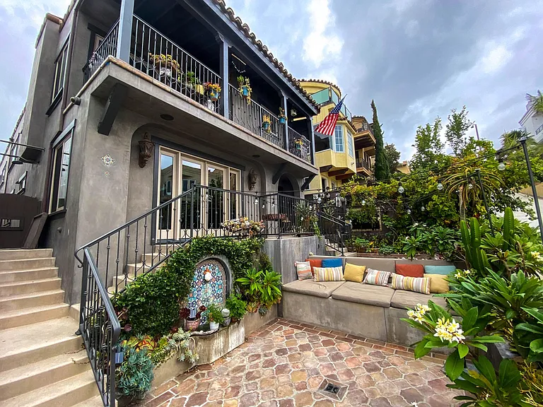 Ocean view walk street entertainment deck with Oudoor lighting, Sonos speakers, Built in outdoor couch, gas fire pit and fountain