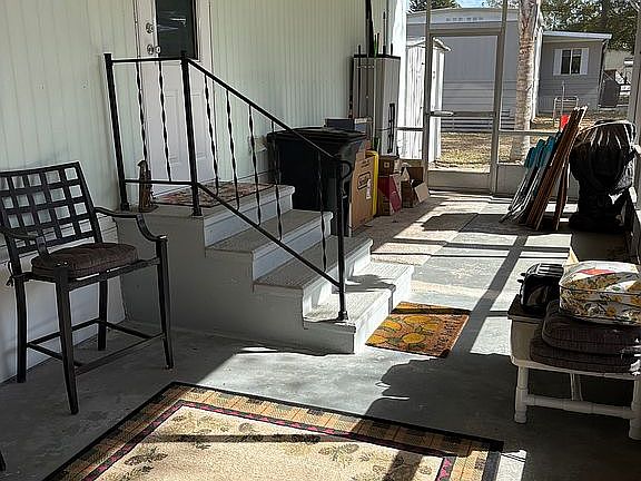 Screen porch off carport