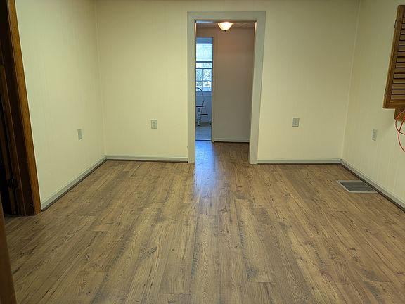 living room toward hall and bath