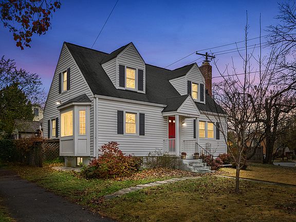 Side view of home with bay window.