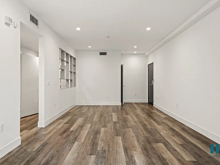 Front Entrance and Living Room with Hall Closet