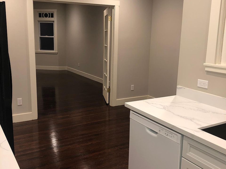 Leaving kitchen into dining area and living area. Living area could also be used as a second bedroom