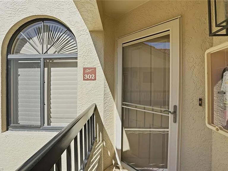 7048 Pelican Bay Blvd #C-302 — Photo 34