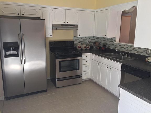5th image of 7103 NW Woodland Dr