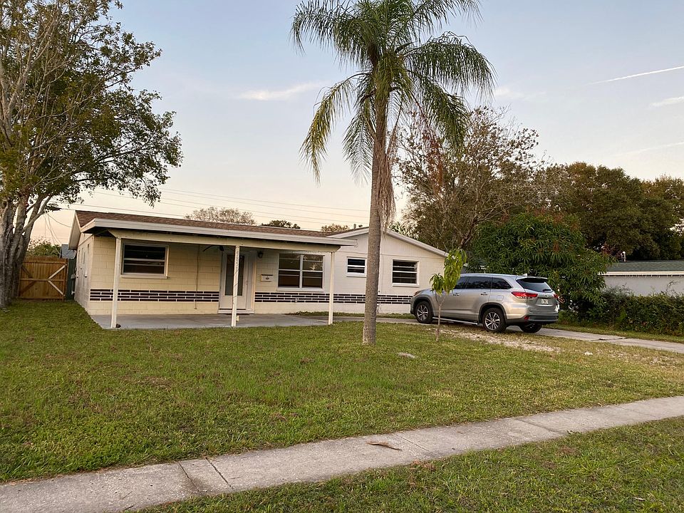Front of the house with carport