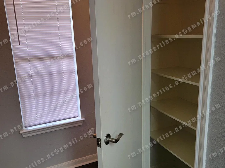 Pantry to the side of the kitchen