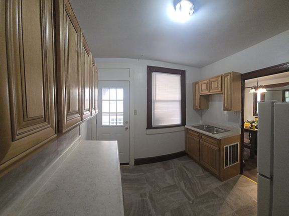 Kitchen. New cabinets and floor.