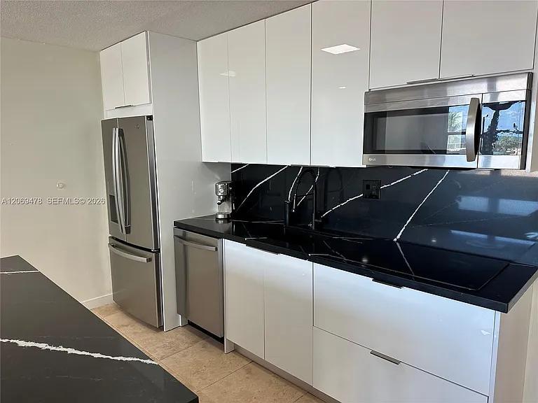 6039 Collins Ave #310 — Photo 1