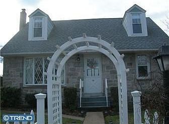 Front view with picket fence