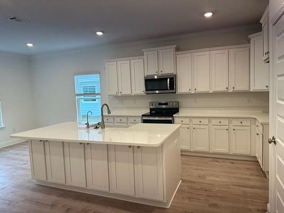 Ample open Kitchen with Quartz counter tops