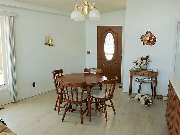 Dining room w/ plank floors