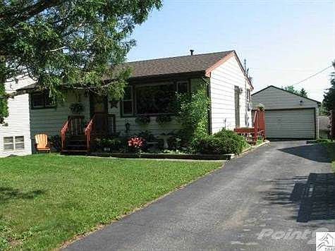 Very cute & comfortable home on a great lot!