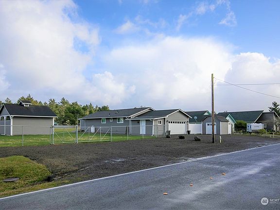 Double fenced lot with a gazebo & firepit.>