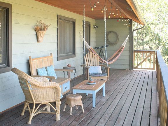 Covered front porch with views to  N.E.