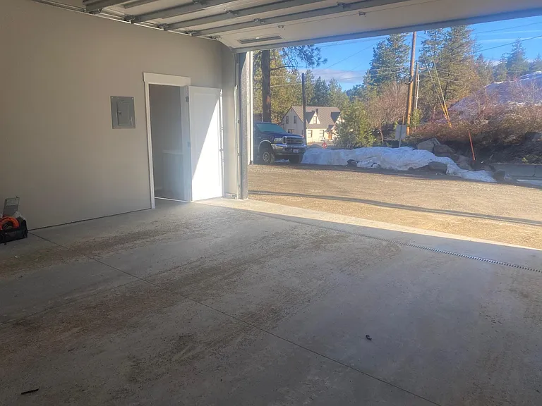 Large garage. Separate entrance. No direct entrance to the living area.