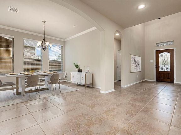 Virtual staging of the formal dining room and foyer