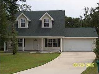Lovely home built in 2003 with dormers and inviting front porch