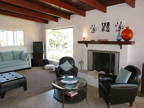 Living Room with fireplace and beamed ceiling