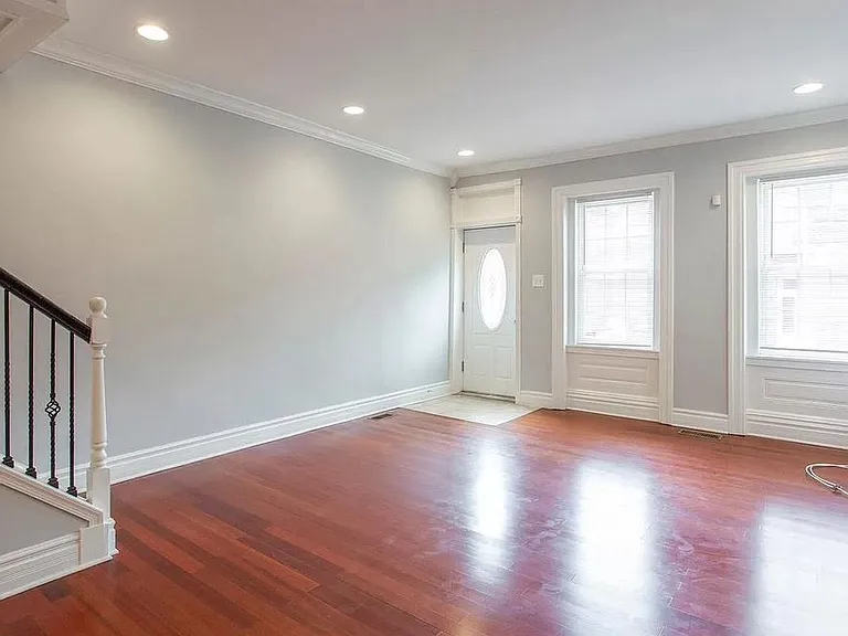 Unfurnished Living Room. View from Powder Room