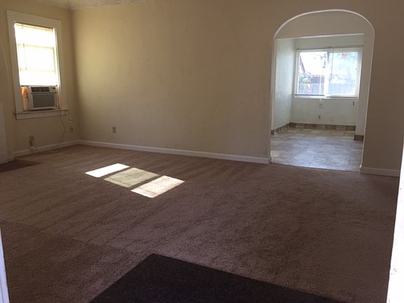 LR into arched dining area