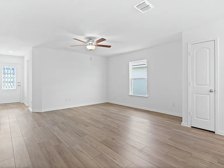 The foyer leads to the family room.