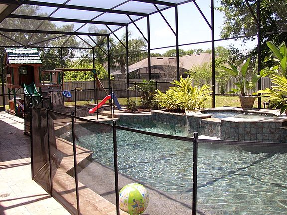 Screened Pool, Spa & Play Area