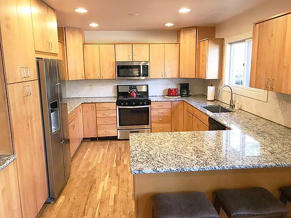 Fresh paint, refinished hardwood floor, new granite countertop in kitchen. New refrigerator and sink.