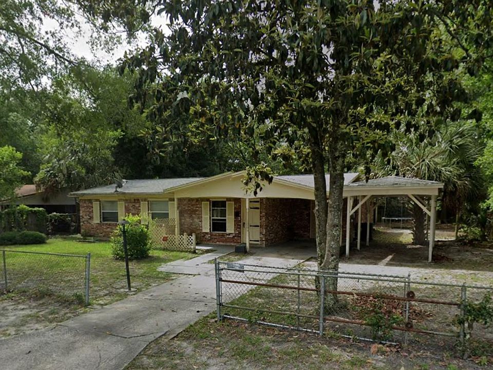 Front of the house with carport