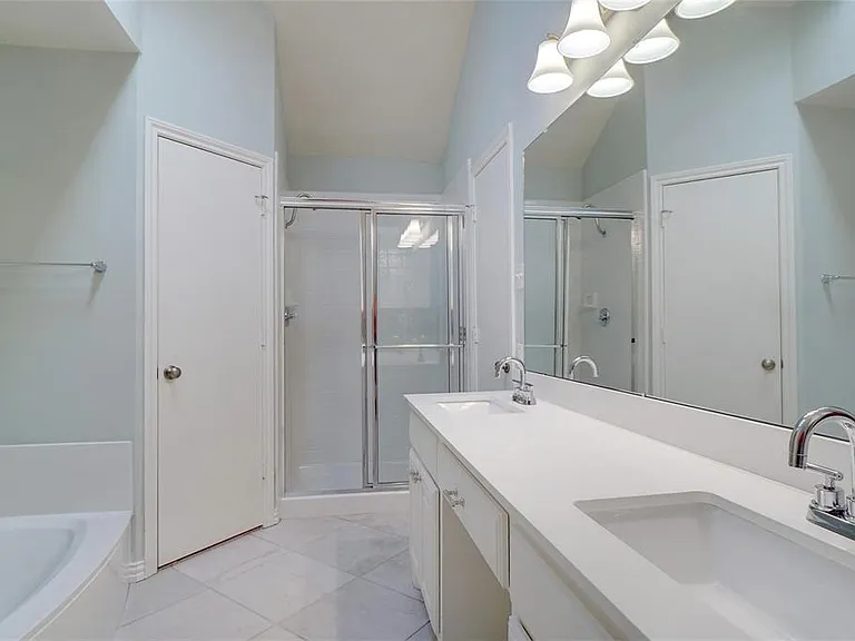 En-suite Bathroom for Primary Bedroom - Quartz Countertops with Stainless Plumbing Fixtures