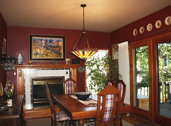 This terrific dining area is located just off the kitchen.