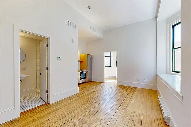 Facing in from entry door towards bedroom.