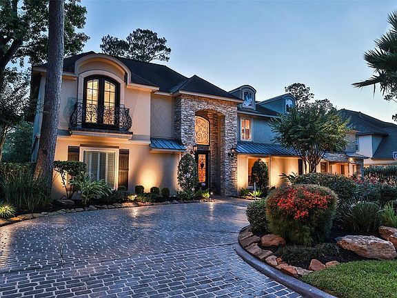 TIMELESS CUSTOM 6 BEDROOM HOME IN STUCCO AND STACKED STONE - the home was originally built in 1972 then extensive enlarged and remodeled in 2003 by Tom Hargrove, a very reputable custom home builder. The details in the home are just breath-taking.