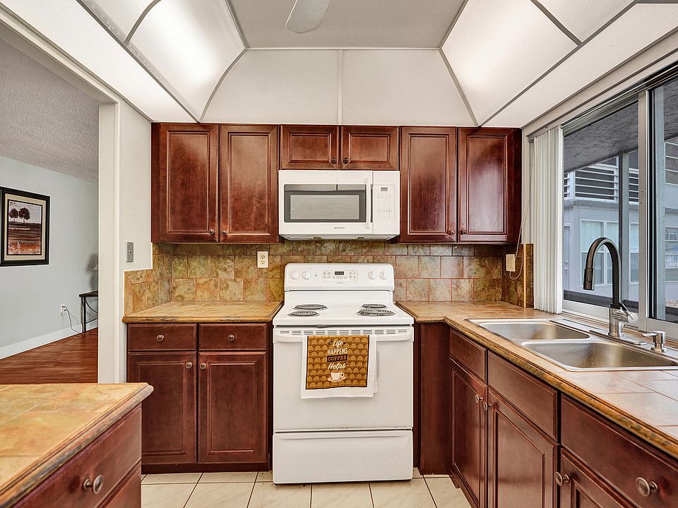 1st image of 9080 Lime Bay Boulevard #104