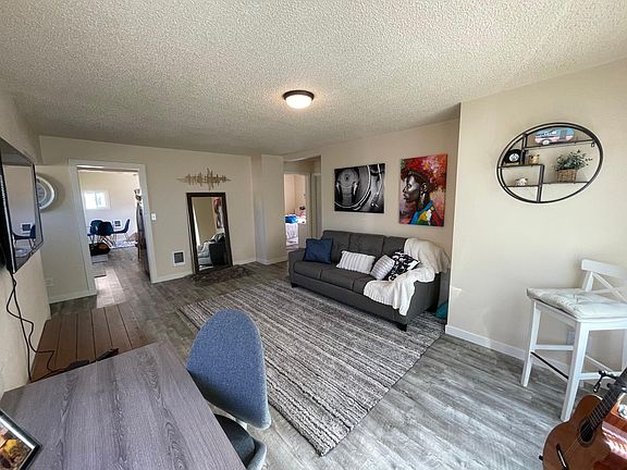 Living Room, with entry to Kitchen.
