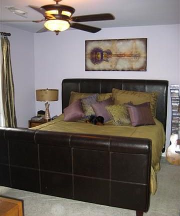 The spacious, main level master bedroom is large enough for a king size bed!