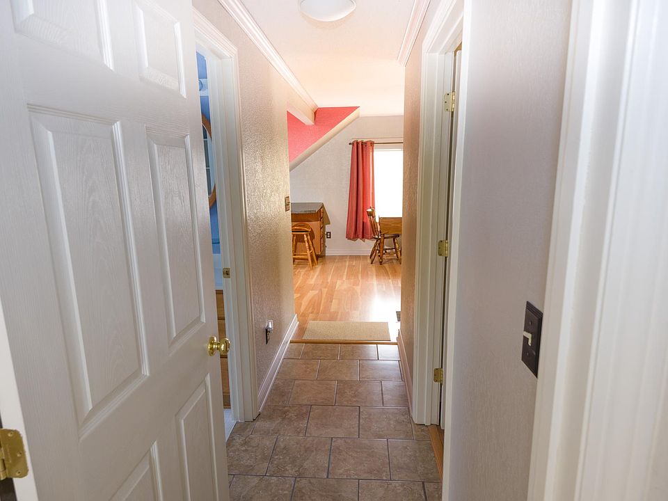 (View from stairway landing) Entry to apartment