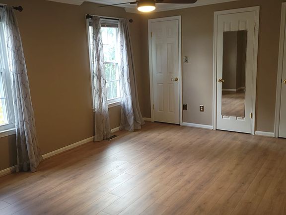 Master bedroom, new flooring and ceiling fan